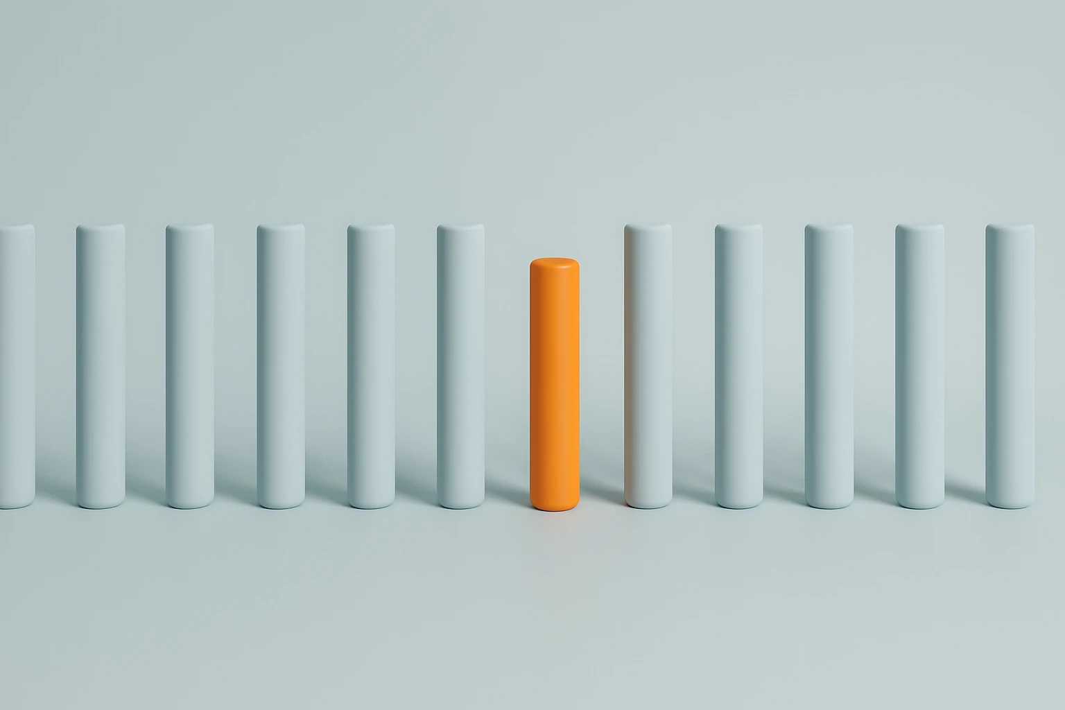 Creation by wordpressive: This minimalist 3D rendering showcases twelve vertical cylinders in a soft blue-gray hue, with one distinct orange bar, slightly shorter and thicker, standing out to the right. The clean lines, even lighting, and subtle shadows create depth, while the harmonious color contrast directs attention to the orange bar, which serves as the focal point placed slightly off-center.